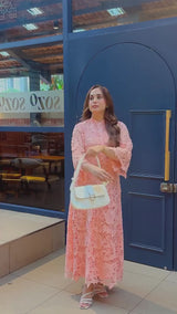 Tahera Fatima in Peach cotton schiffli dress
