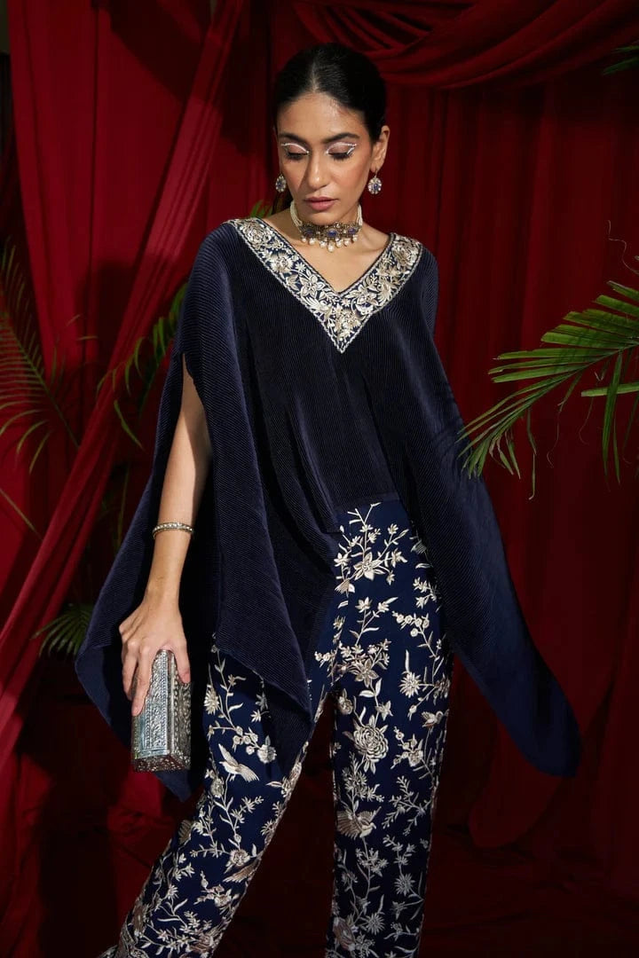 Tasuvure X MW  Reyna Gara Glazed Embroidered Pleated V- Neck Cape Coordinated with Straight Pants - Navy Blue